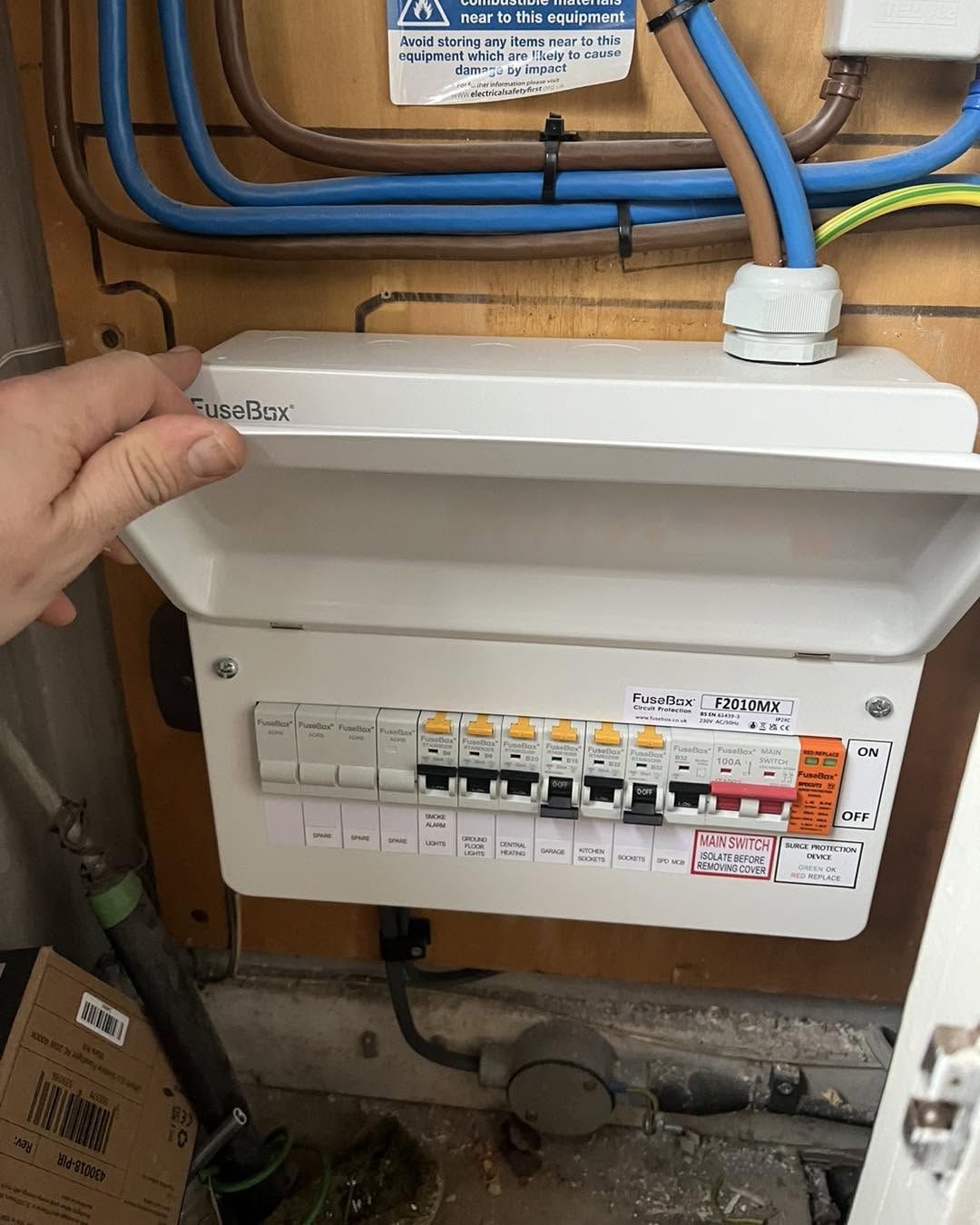 Multifunction tester running a test on a consumer unit